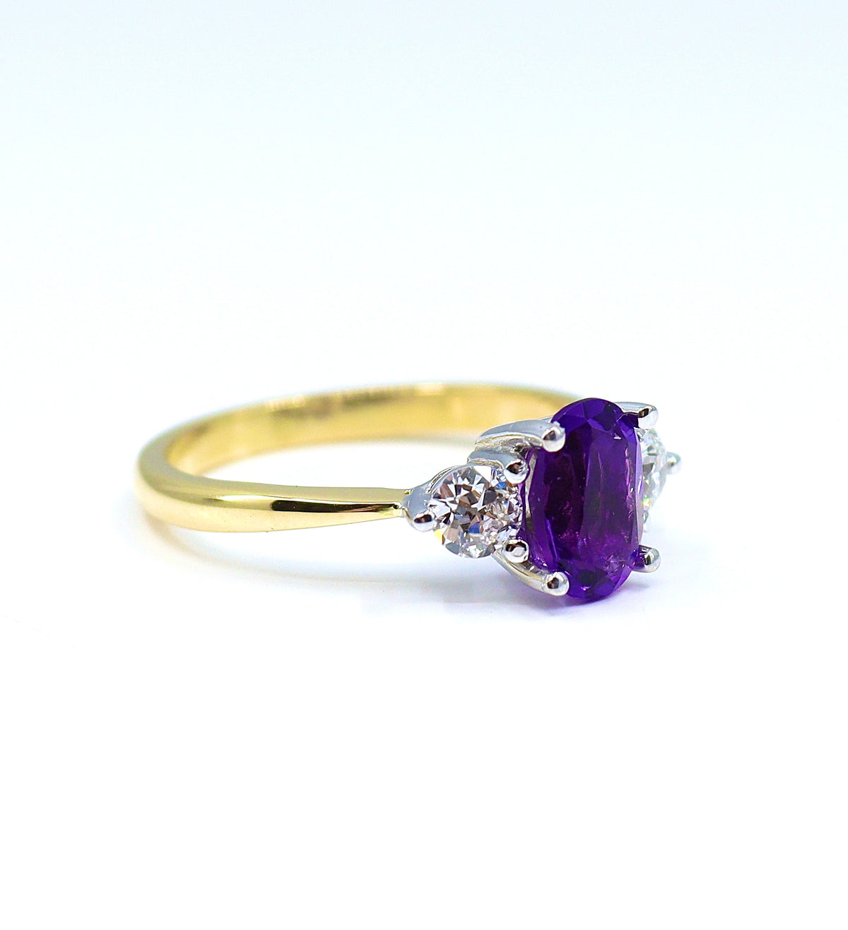 A timeless amethyst &amp; diamond three stone ring in 18ct yellow &amp; white gold