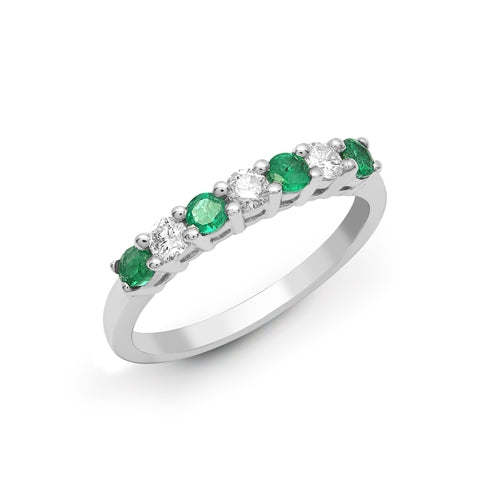 Emerald and diamond eternity ring in white gold