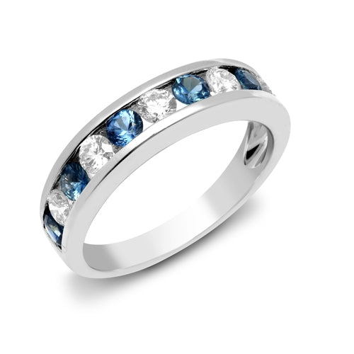 Sapphire and diamond channel set eternity ring in white gold
