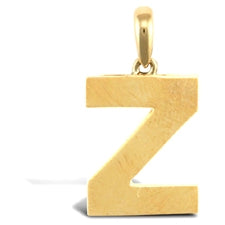 Initial pendant in gold